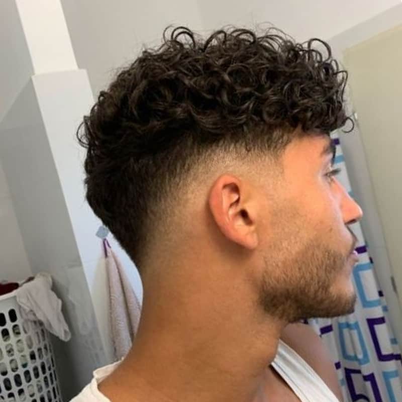A man with a broccoli haircut