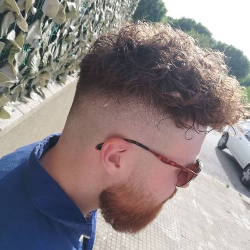 A man with a broccoli haircut