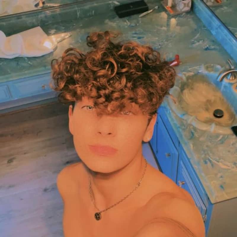 A man with a broccoli haircut