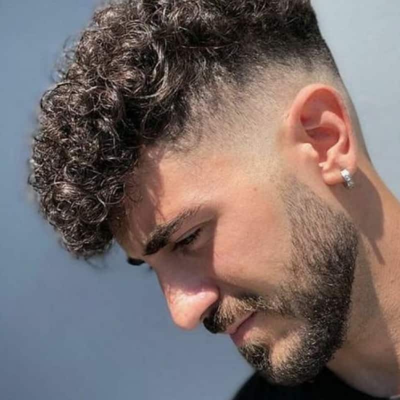 A man with a broccoli haircut