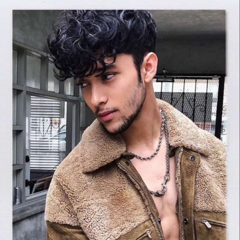 A man with a broccoli haircut