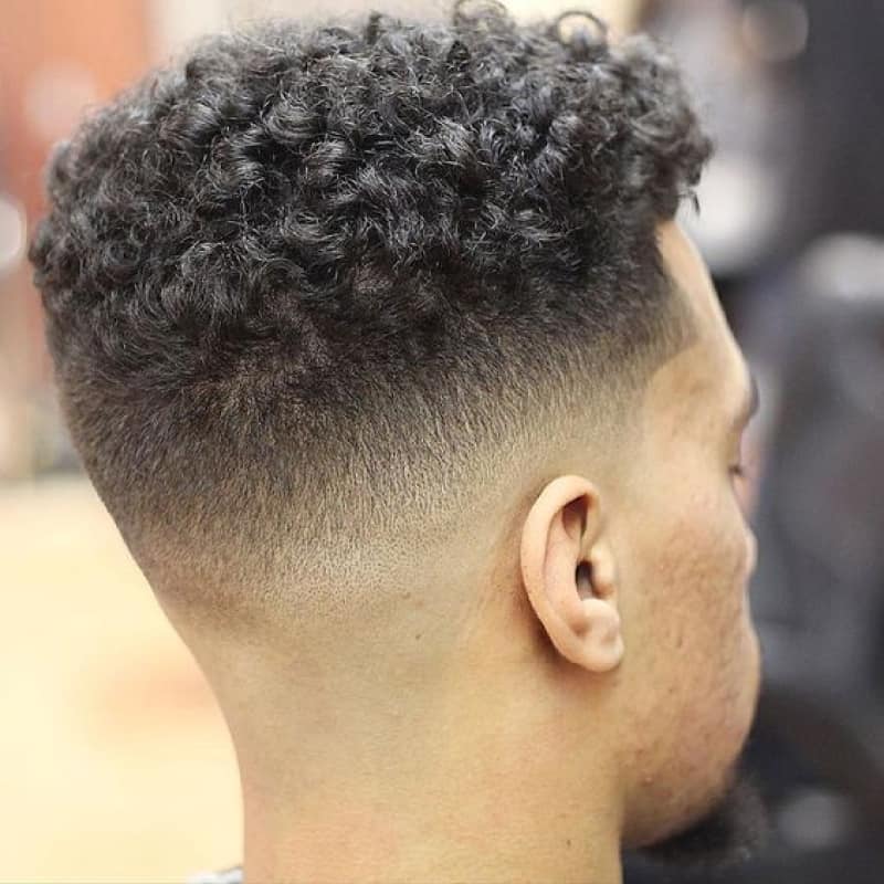 A man with a broccoli haircut