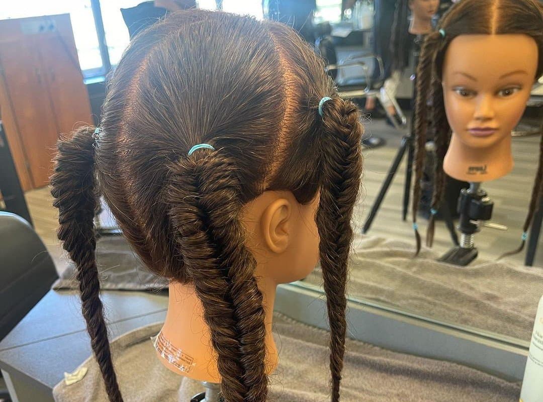girl with brown 4-fishtail braids