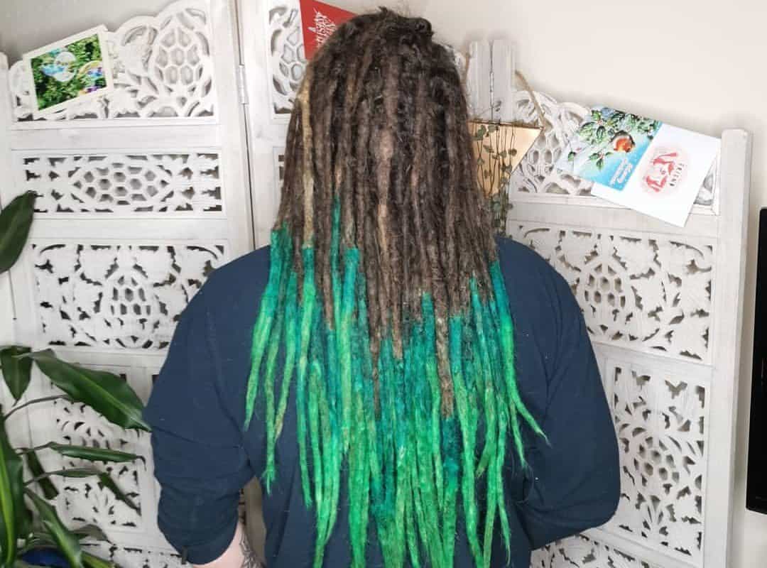 girl with brown and green dyed dreads
