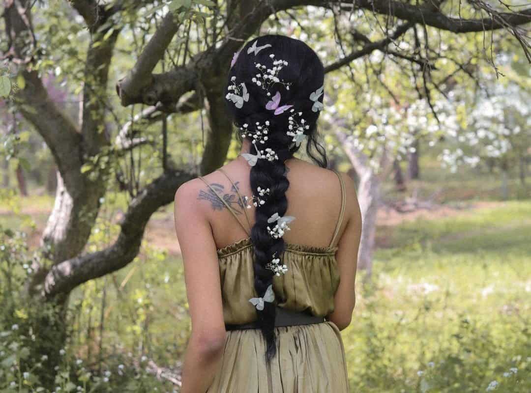 girl with brown braid fairy with flowers