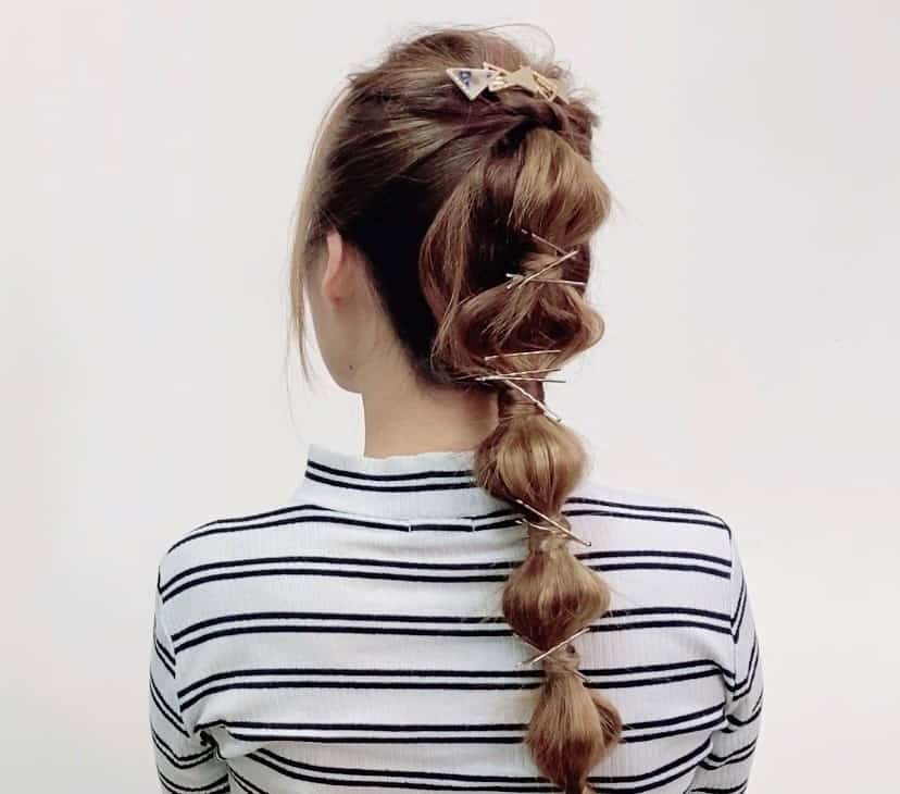girl with brown bubbles hairstyle