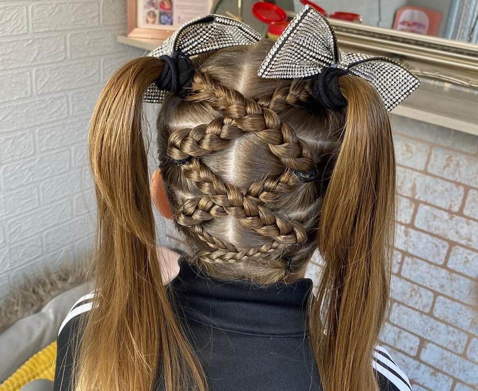 girl with brown cheer pigtails hairstyle