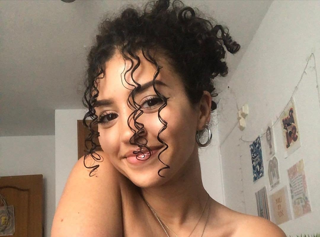 girl with dark brown curls