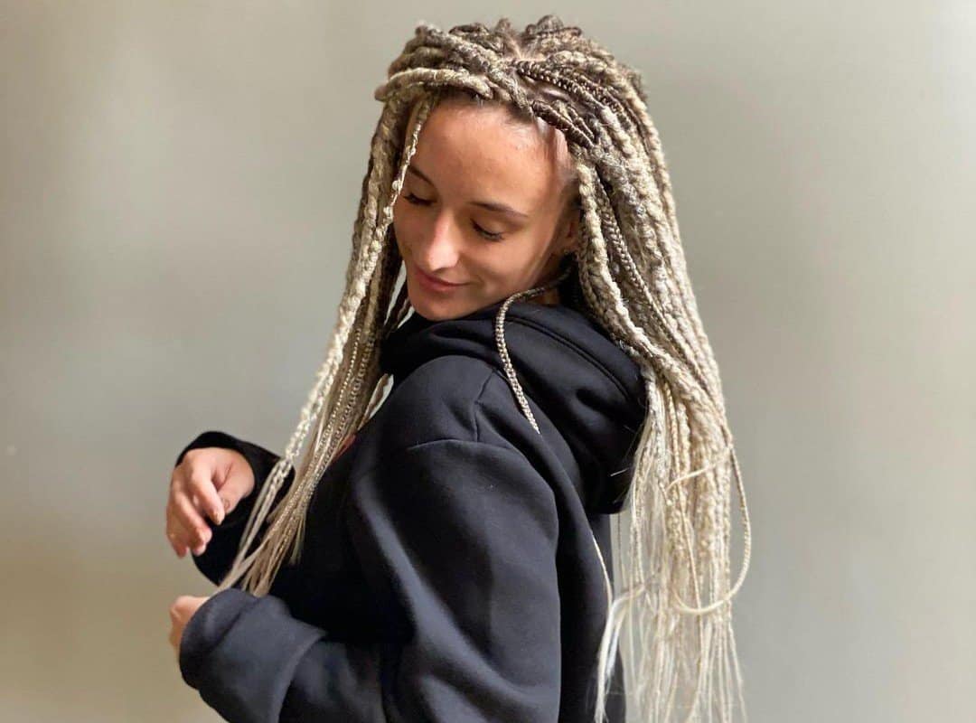 woman with brown and white long hippie dreads
