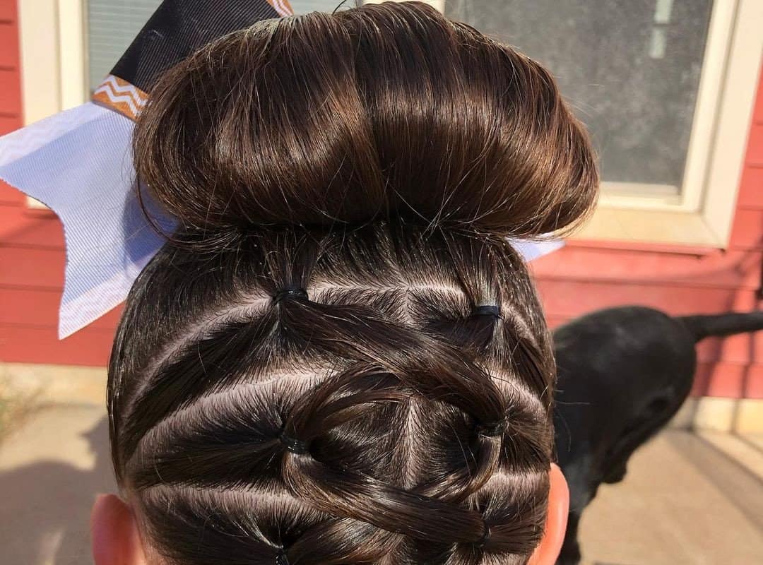 girl with a brown cheer bun
