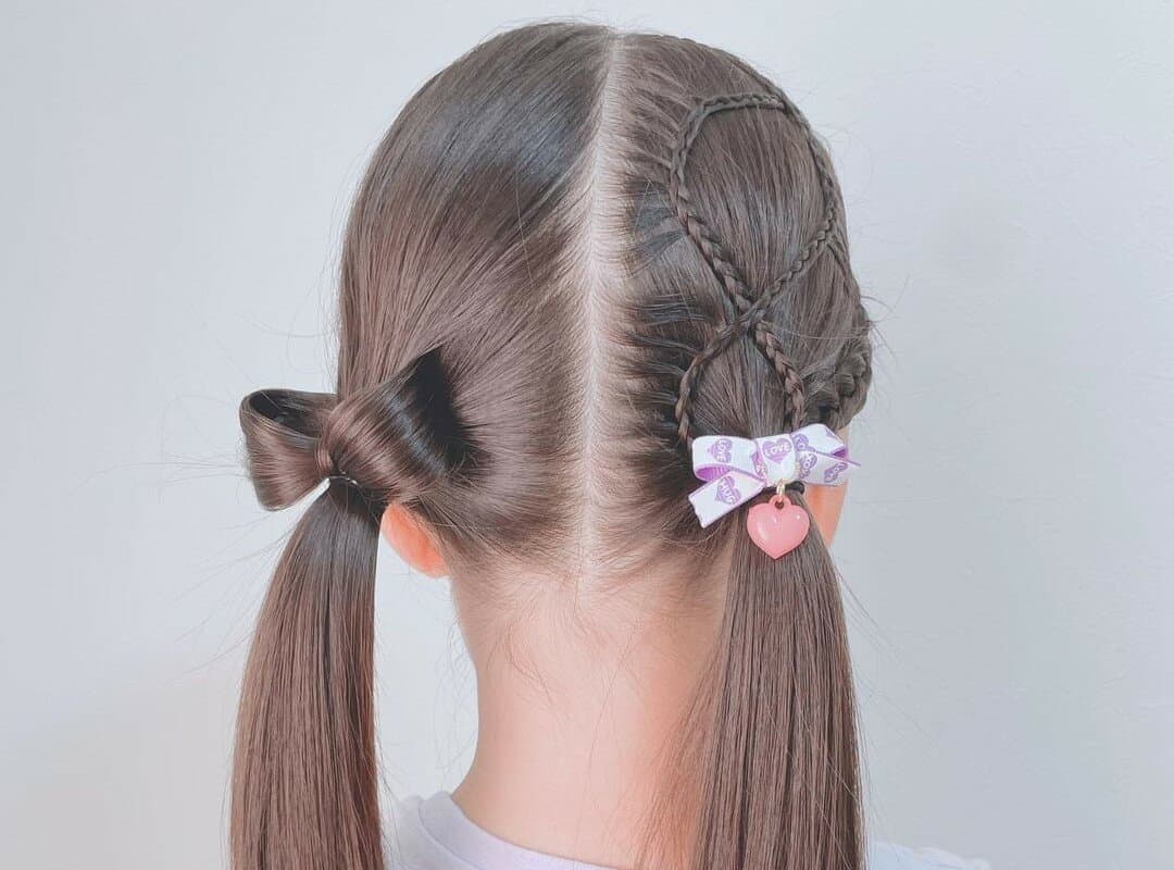girl with brown cheer two pigtails