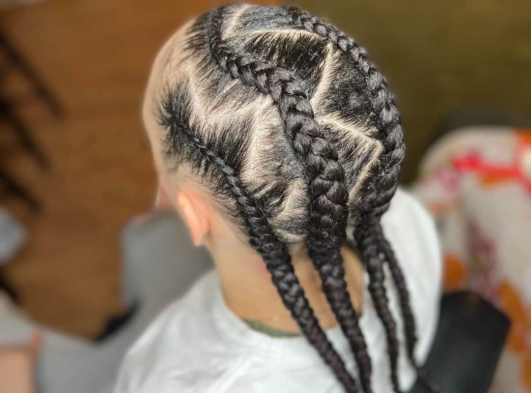 girl with dark brown 4-jumbo braids