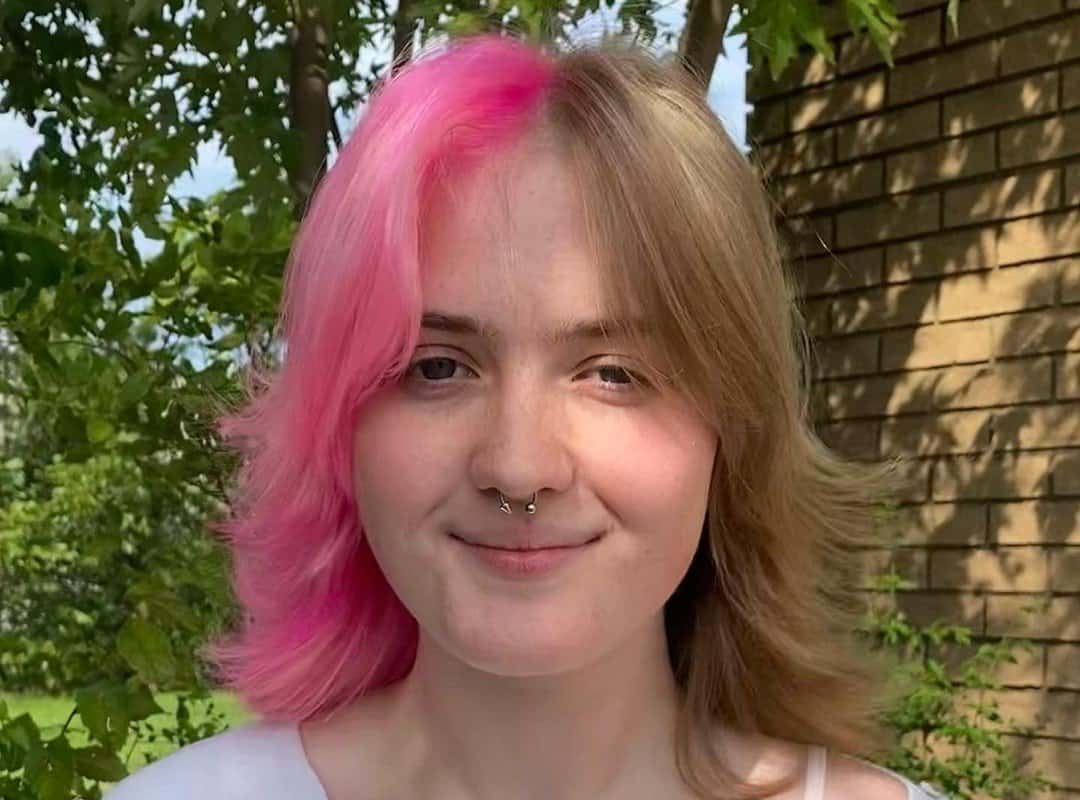 girl with blonde and pink split dyed hairstyle