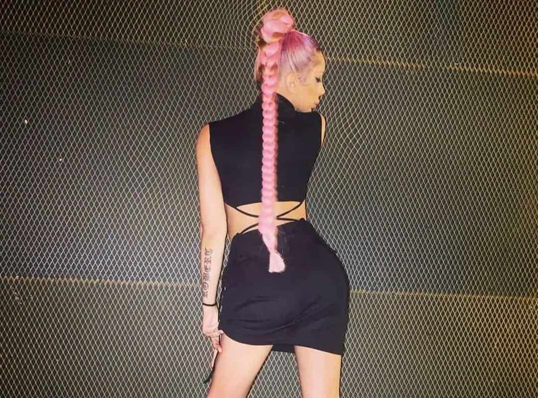 girl with pink high braided ponytail