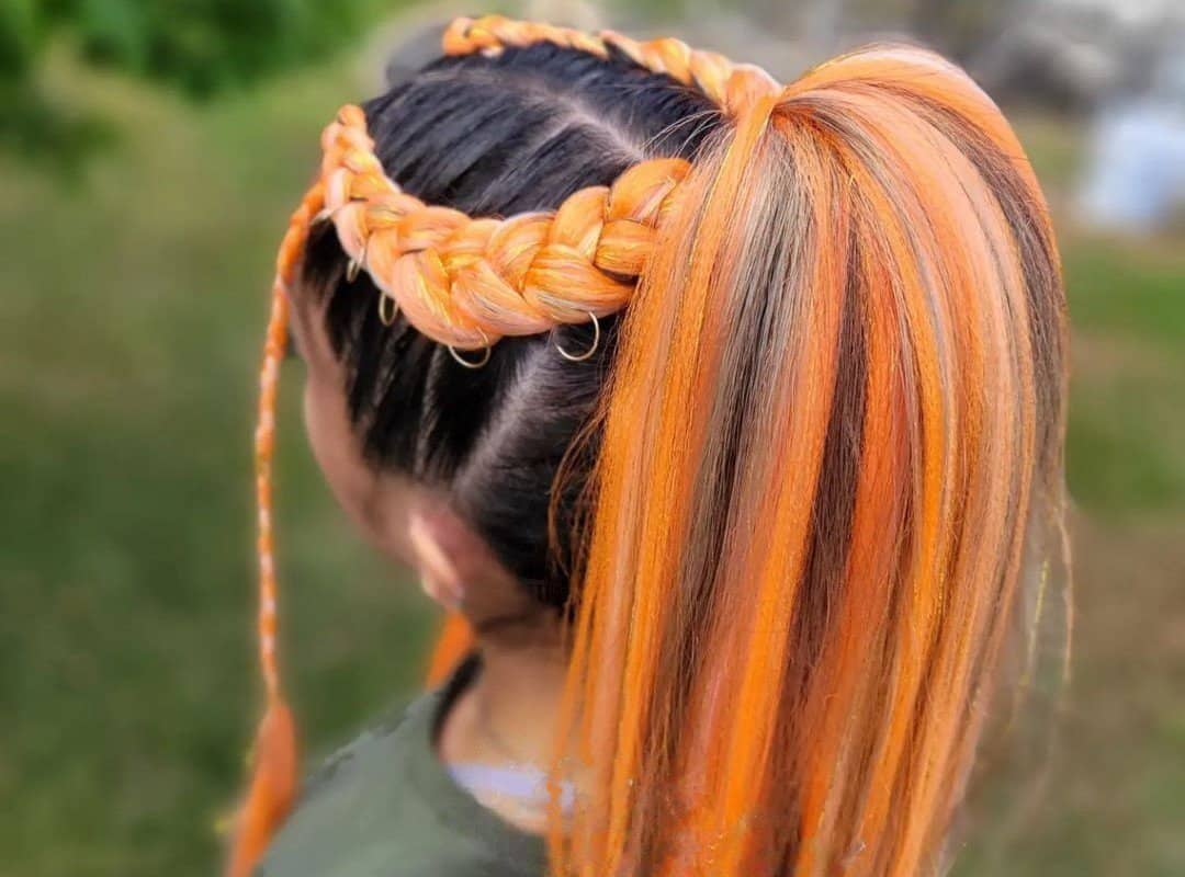 girl with red braided ponytail