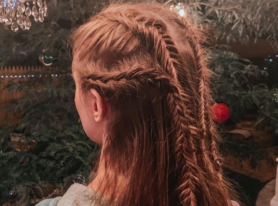 girl with red 4-fishtail braids