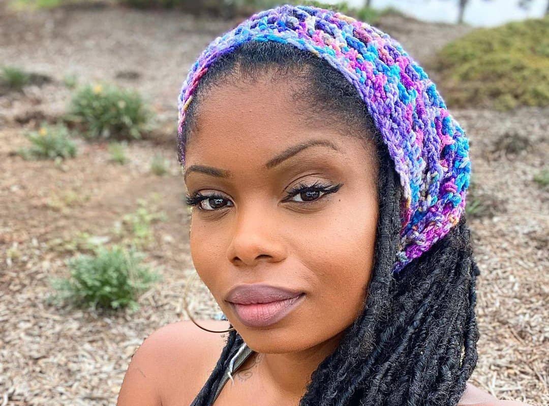 woman with hippie dreads in a bandana